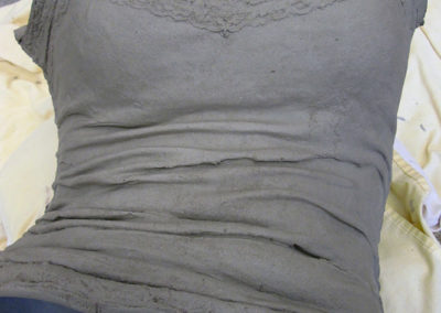 Clay figure being constructed - torso